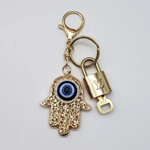 100% Auth Louis Vuitton Lock & Key with unbranded Bagcharm, Keycharm, Keychain