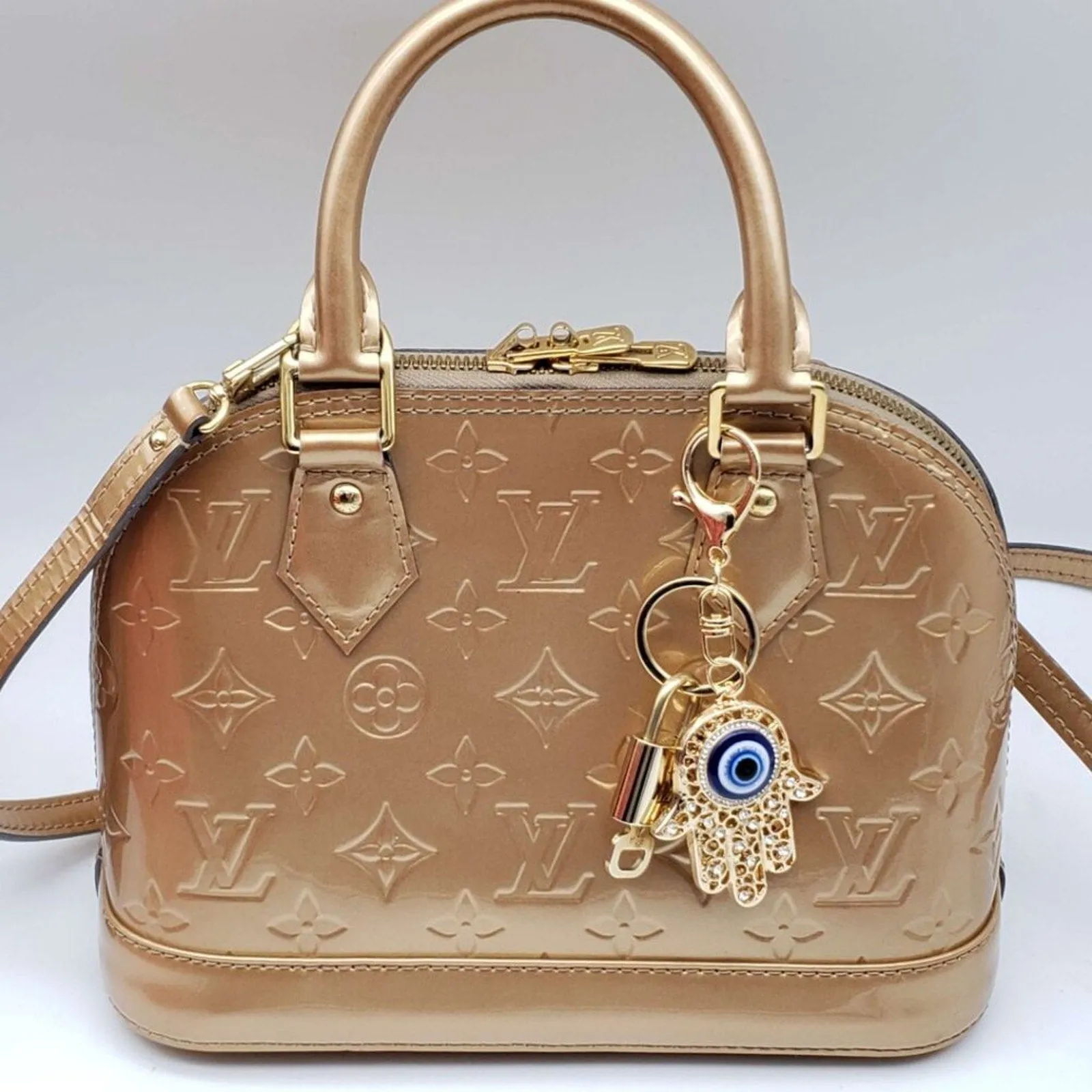 100% Auth Louis Vuitton Lock & Key with unbranded Bagcharm, Keycharm, Keychain