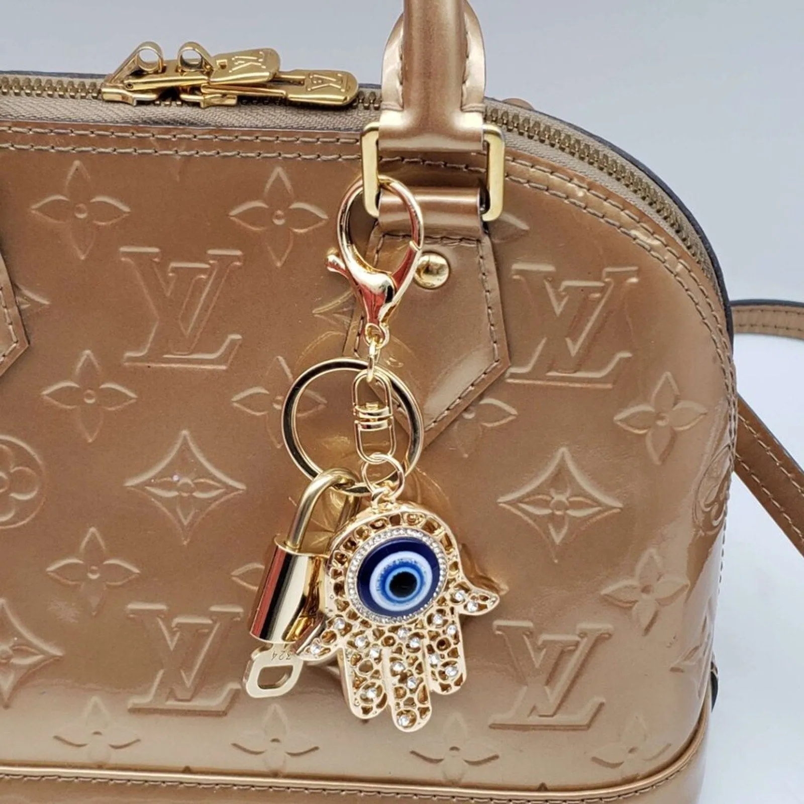 100% Auth Louis Vuitton Lock & Key with unbranded Bagcharm, Keycharm, Keychain