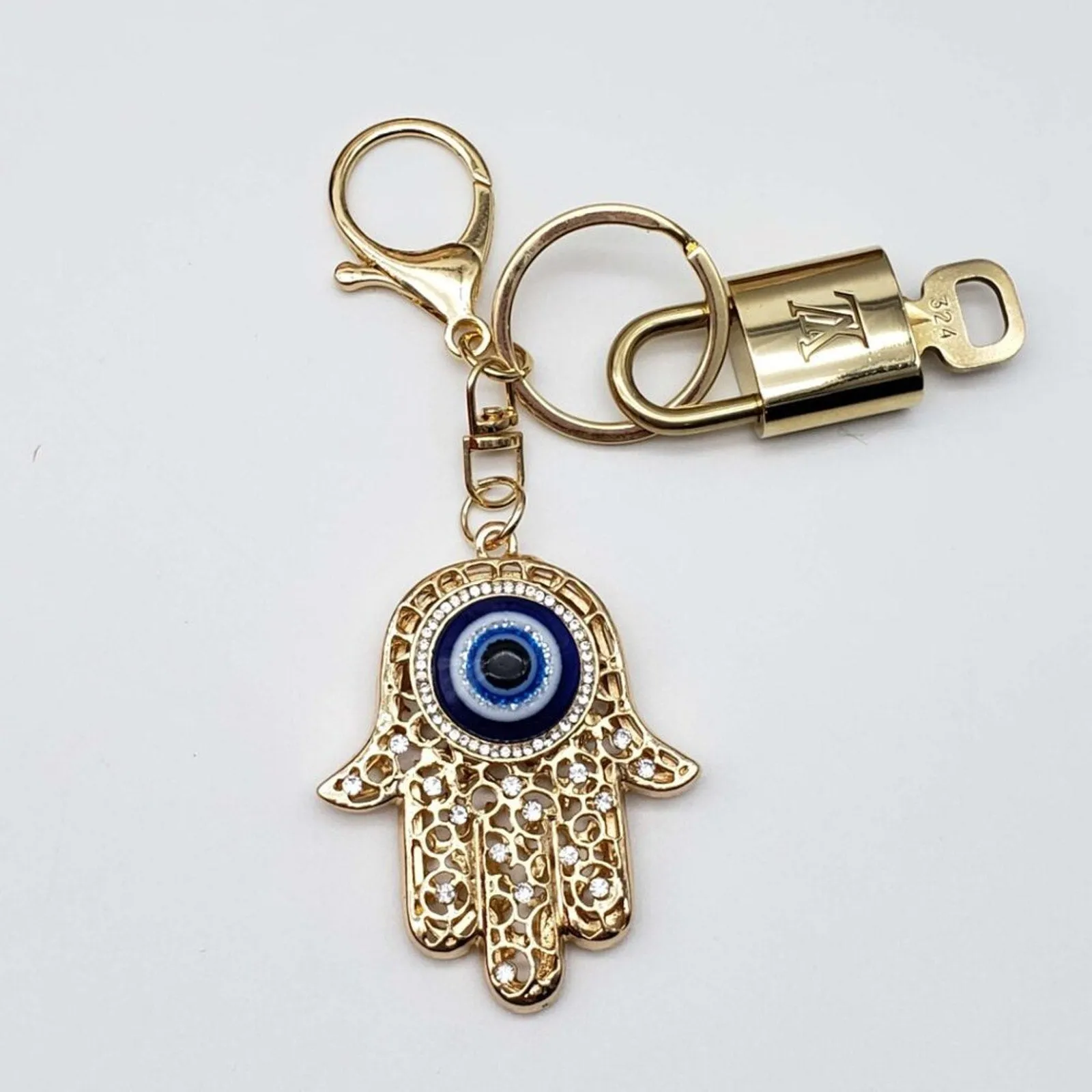 100% Auth Louis Vuitton Lock & Key with unbranded Bagcharm, Keycharm, Keychain