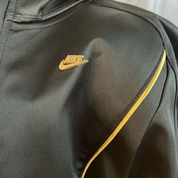 Black and gold Nike coat