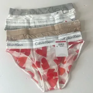Calvin Klein Assortment of Bikini Panties 4 Pairs. Size XS