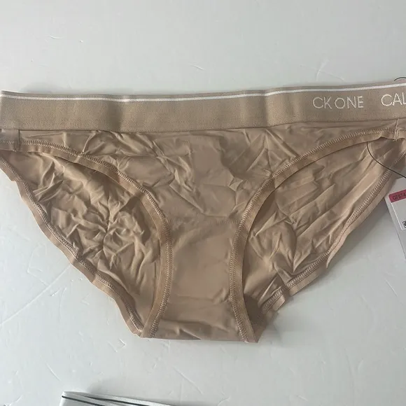 Calvin Klein Assortment of Bikini Panties 4 Pairs. Size XS