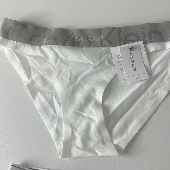 Calvin Klein Assortment of Bikini Panties 4 Pairs. Size XS